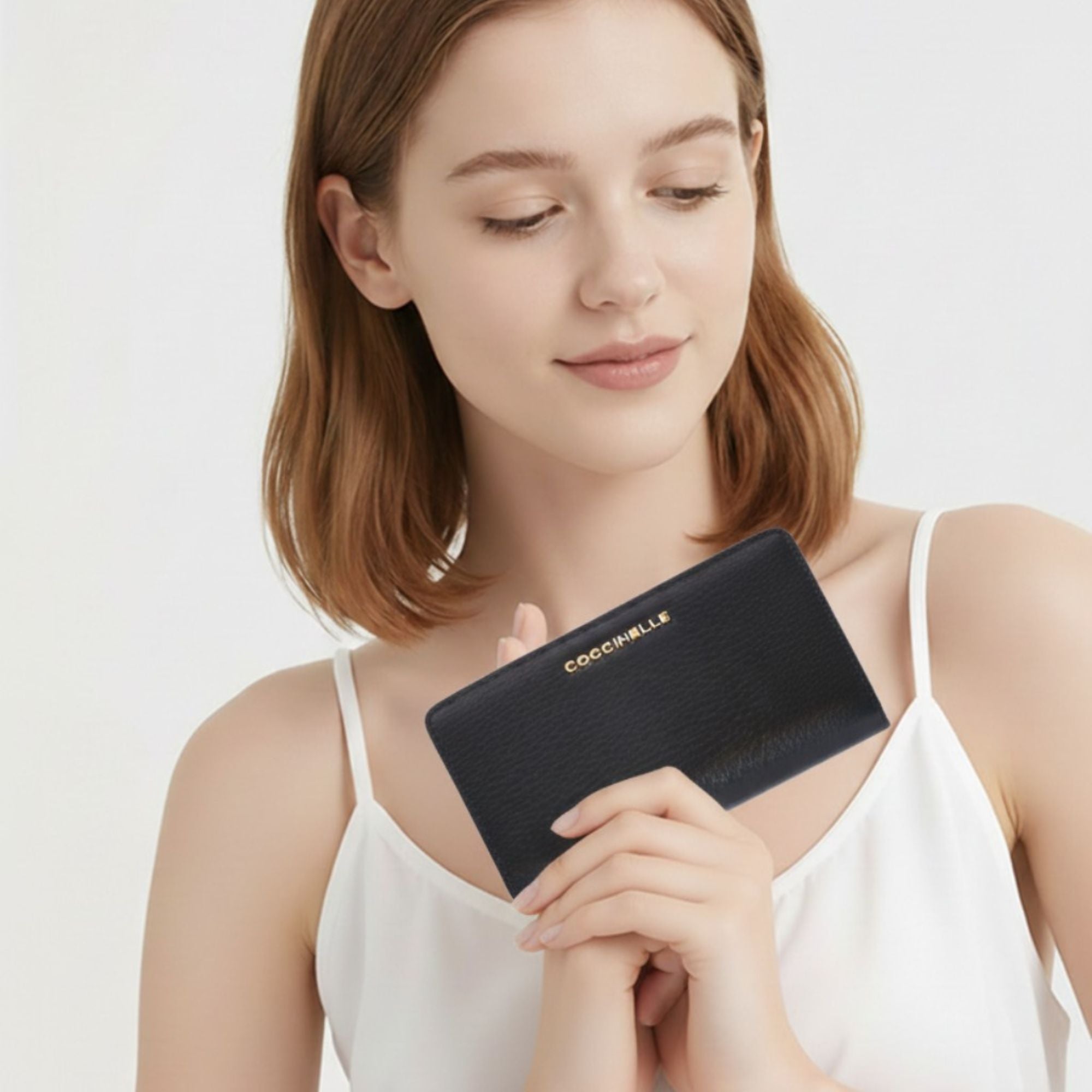 Coccinelle Black Leather Wallet – Compact Luxury Card Holder